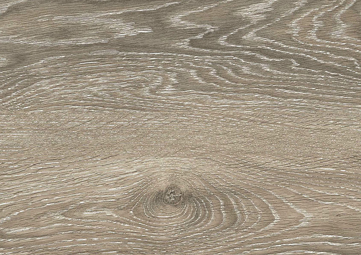 A close-up texture of a light brown wood grain surface with natural swirling patterns and a small knot near the bottom center.