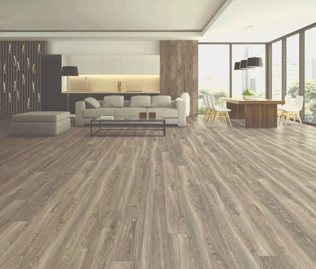 Modern living room with wooden flooring, furniture, and large windows.