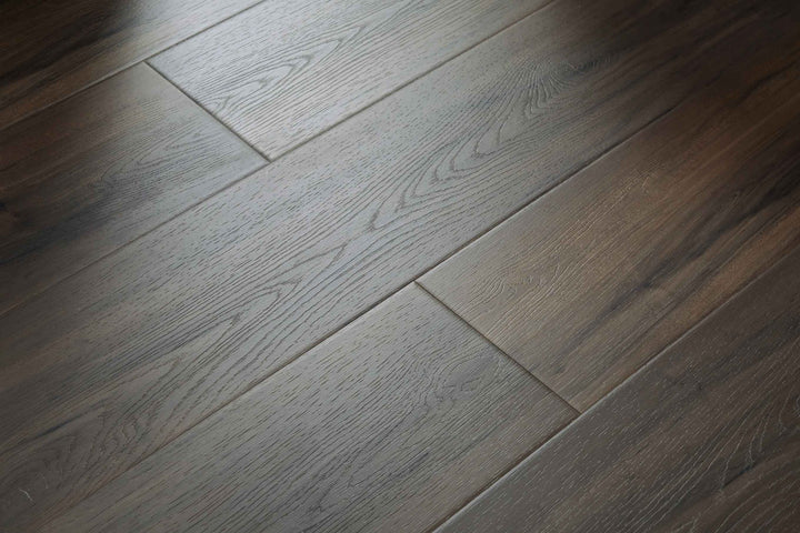 Dark brown wood-look flooring planks with a realistic grain texture and subtle sheen.