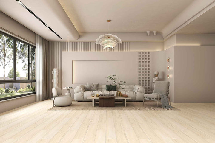 Modern living room with a neutral color palette, featuring a sofa, coffee table, and decorative items.