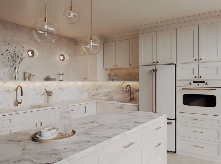 Modern kitchen with marble countertops and white cabinetry