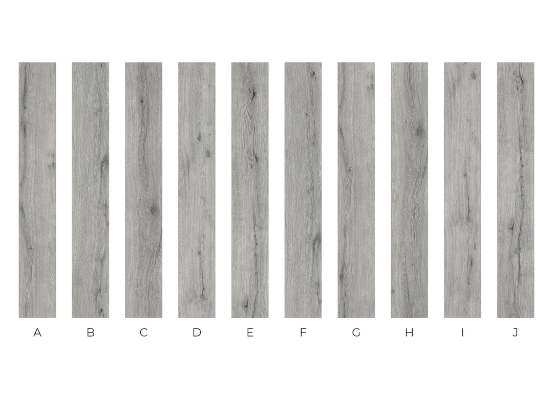 A row of ten vertical wood-look sample panels labeled A through J on a white background, showing different gray wood grain patterns.