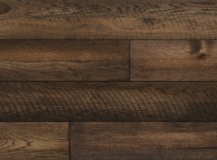Dark brown wood plank flooring showing natural grain, knots, and horizontal panel seams.