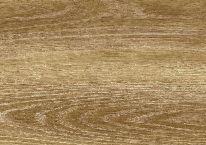 A close-up texture of a light brown wood grain surface with natural wavy lines and a smooth finish.