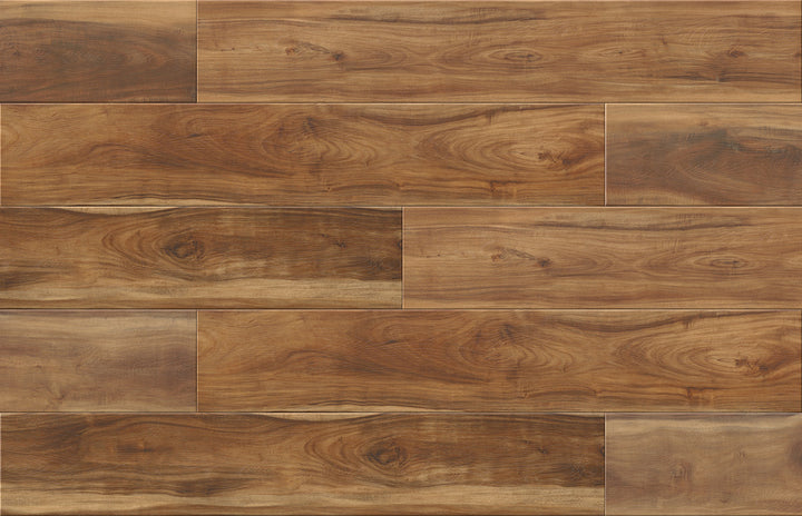 Brown wood plank flooring with varied grain patterns and natural knots, arranged in a staggered brick layout.