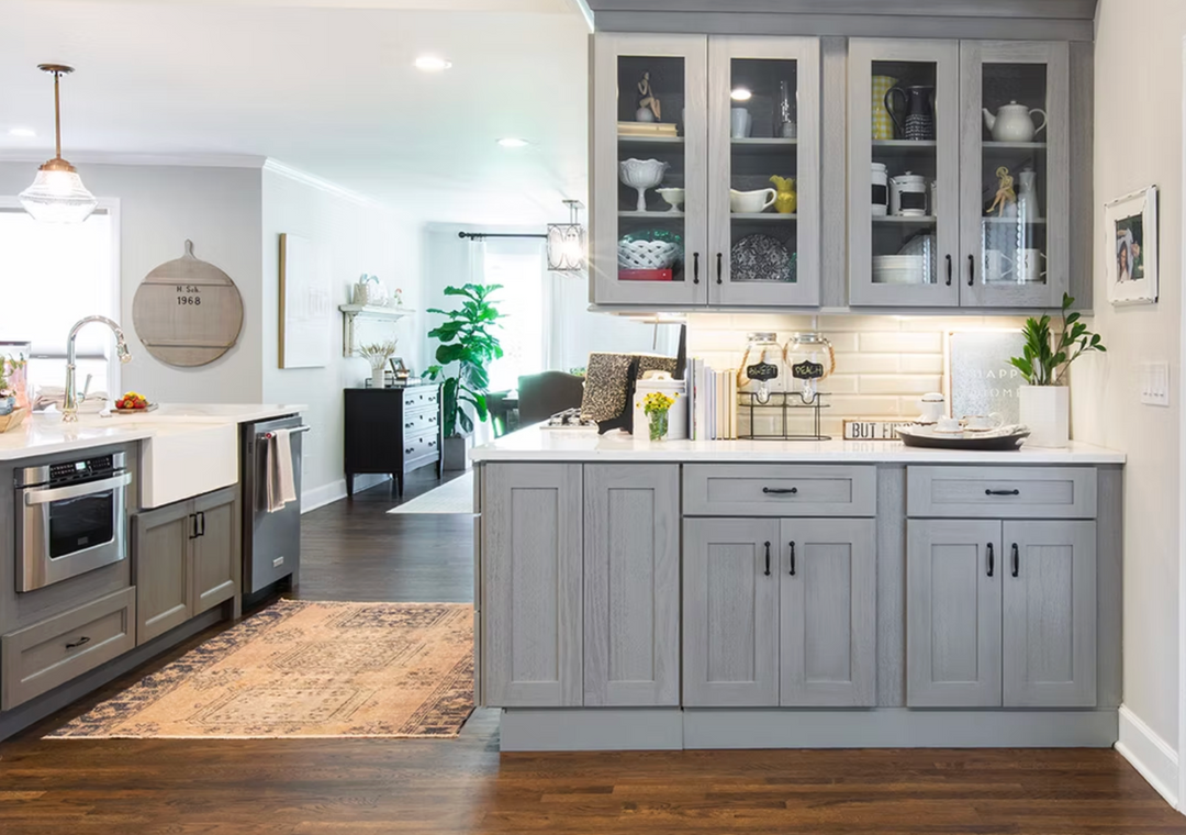 Modern kitchen with gray cabinets and white countertops