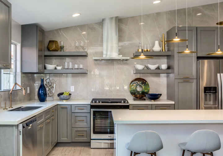 Modern kitchen with stainless steel appliances and gray cabinets