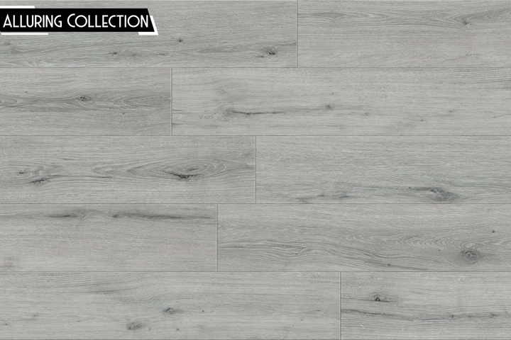 Light gray wood-look flooring planks with visible grain, knots, and plank seams, shown as a surface sample. A black label in the top-left corner reads 'ALLURING COLLECTION'.