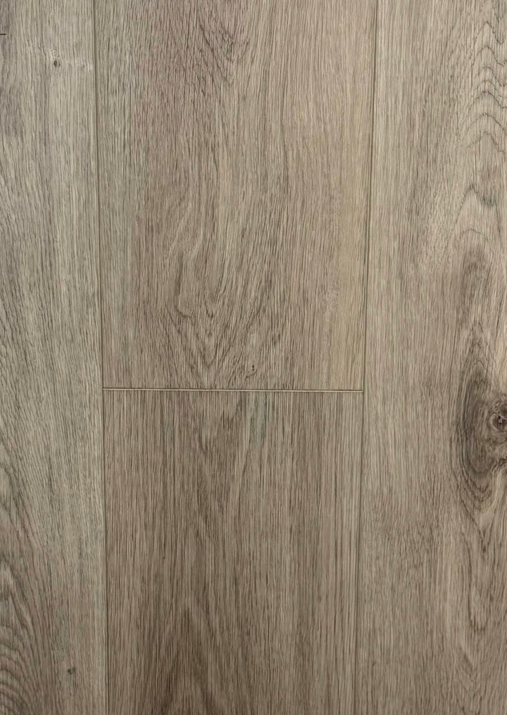 Light brown wood-look flooring planks with visible grain, knots, and natural texture.