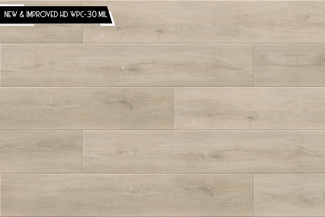Light beige wood-look flooring planks with a natural grain texture, shown in a horizontal layout. A black label in the top-left corner reads 'NEW & IMPROVED HD WPC-30 ML'.